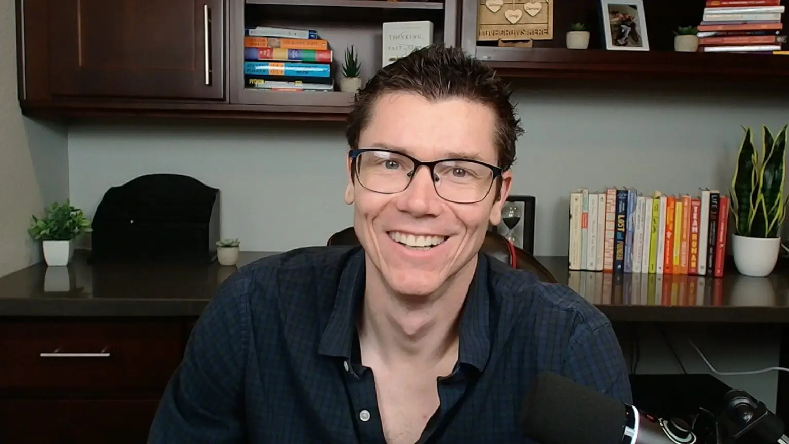 TJ Robertson, digital marketer, at his desk